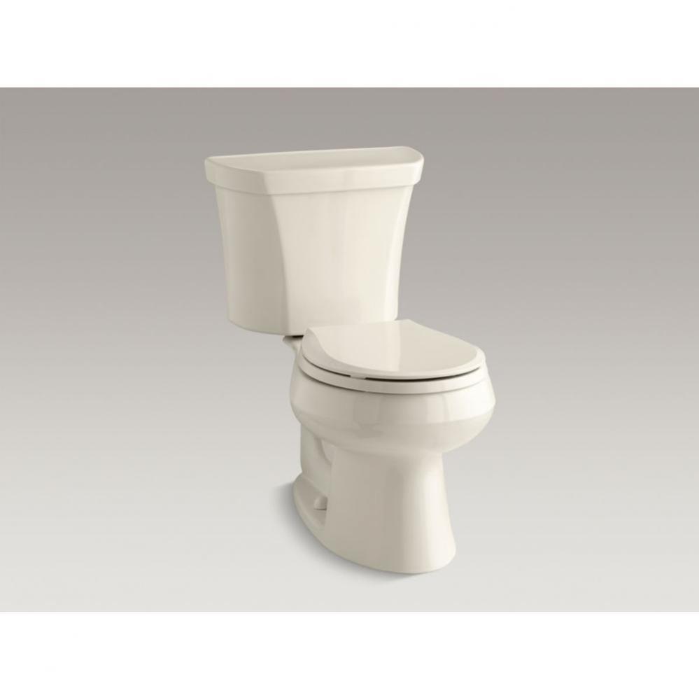 Wellworth® Two-piece round-front dual-flush toilet with right-hand trip lever